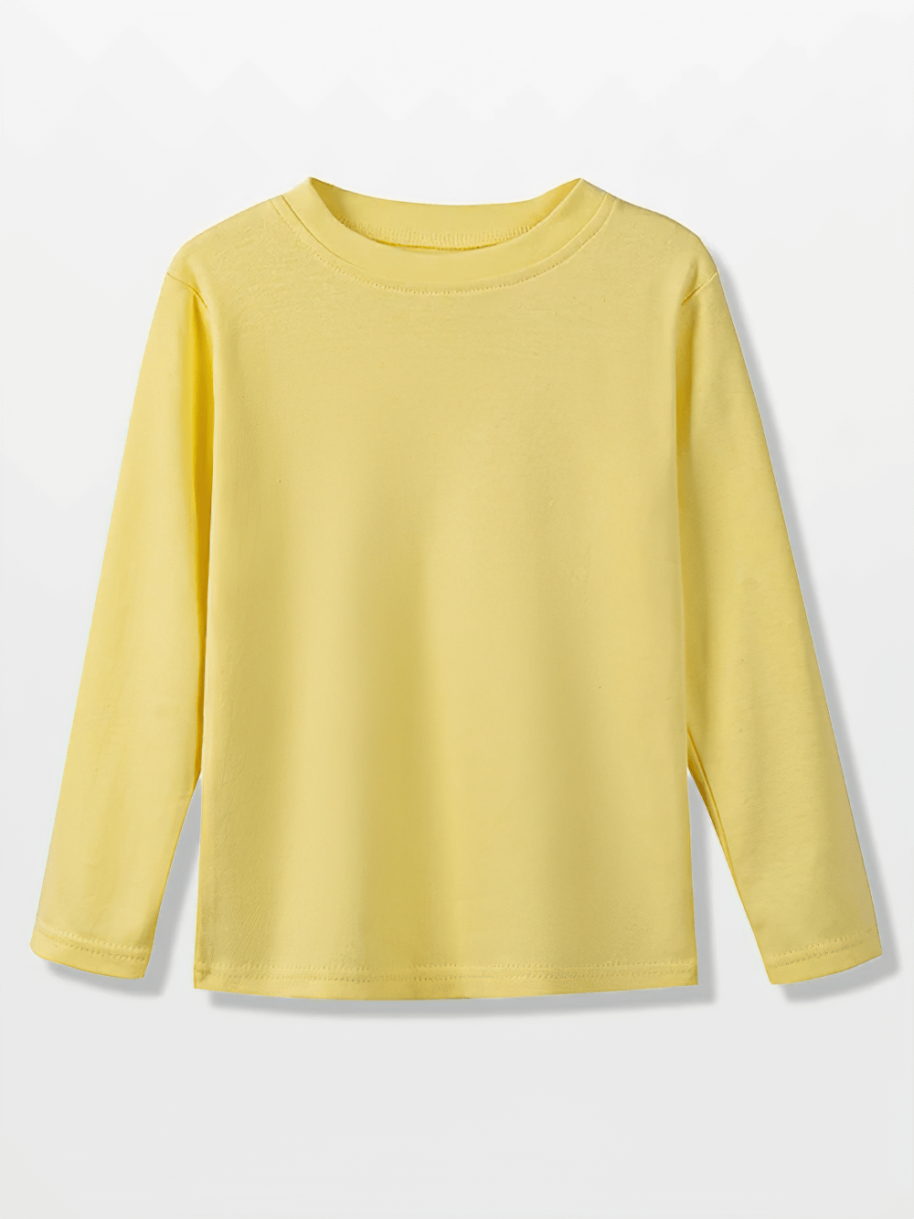 Yellow long-sleeved cotton top, versatile and stylish for casual wear, featuring a round neckline. Perfect for layering or standalone wear.